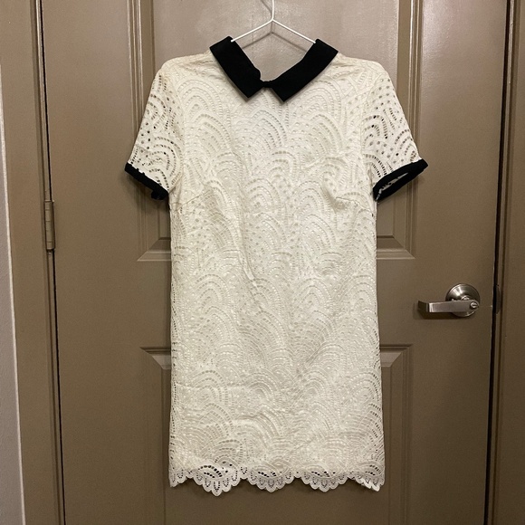 Forever 21 Dresses & Skirts - White lace dress with black collar and black sleeve trim